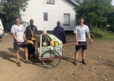 Tandem Africa Team with mkokateni, two wheeled cart