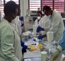 Delegates from the SimpliciTB workshop work with Dr Wilber Sabiiti (University of St Andrews) to learn how to perform the TB MBLA that will be applied to monitor treatment response in the forthcoming OptiRiMoxTB trial